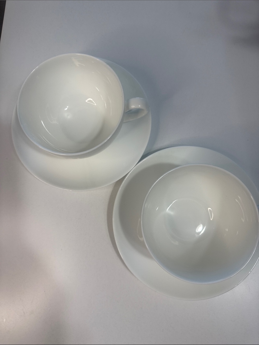 Crate&Barrel Anna’s Artistry Blue Flower Bone China Teacup and Saucer Set of Two - Picture 2 of 8